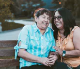 Two related women on a bench